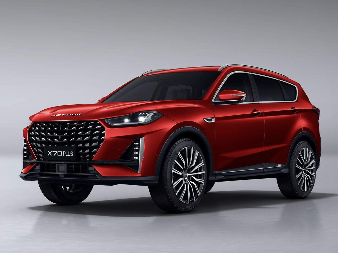 Jetour X70 Plus внедорожник: вид спереди сбоку