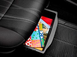 Chevrolet Aveo седан (II поколение, 2012 - 2015 г.в.): Выдвижной ящик под сиденьем