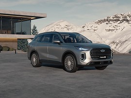Chery Tiggo 9: вид спереди сбоку у гор