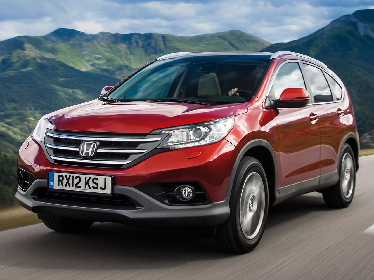 Honda CR-V 2.4 AT Executive: Три четверти спереди на дороге
