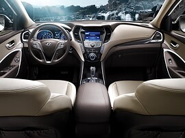 Hyundai Santa Fe (III поколение, 2012 - 2015 г.в.): Салон с бежевой кожей, вид сзади