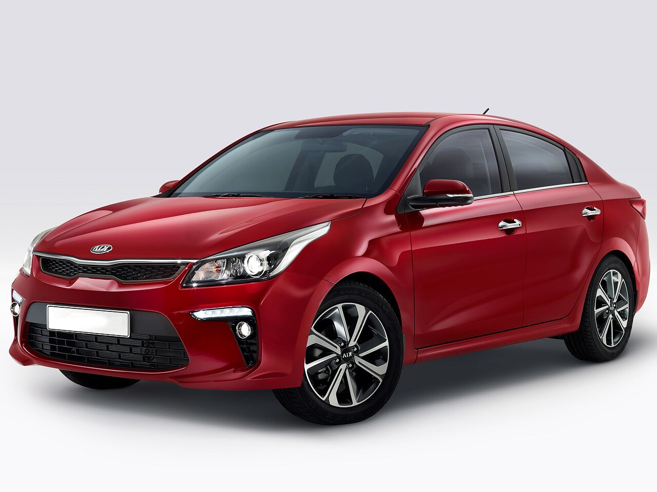 KIA Rio седан (IV поколение, 2017 - 2020 г.в.): Три четверти спереди в студии