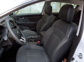 KIA Sportage (III поколение, 2010 - 2014 г.в.): Крупный план переднего сиденья