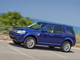 Land Rover Freelander 2 (II поколение рестайлинг, 2010 - 2012 г.в.): В профиль в движении с размытием