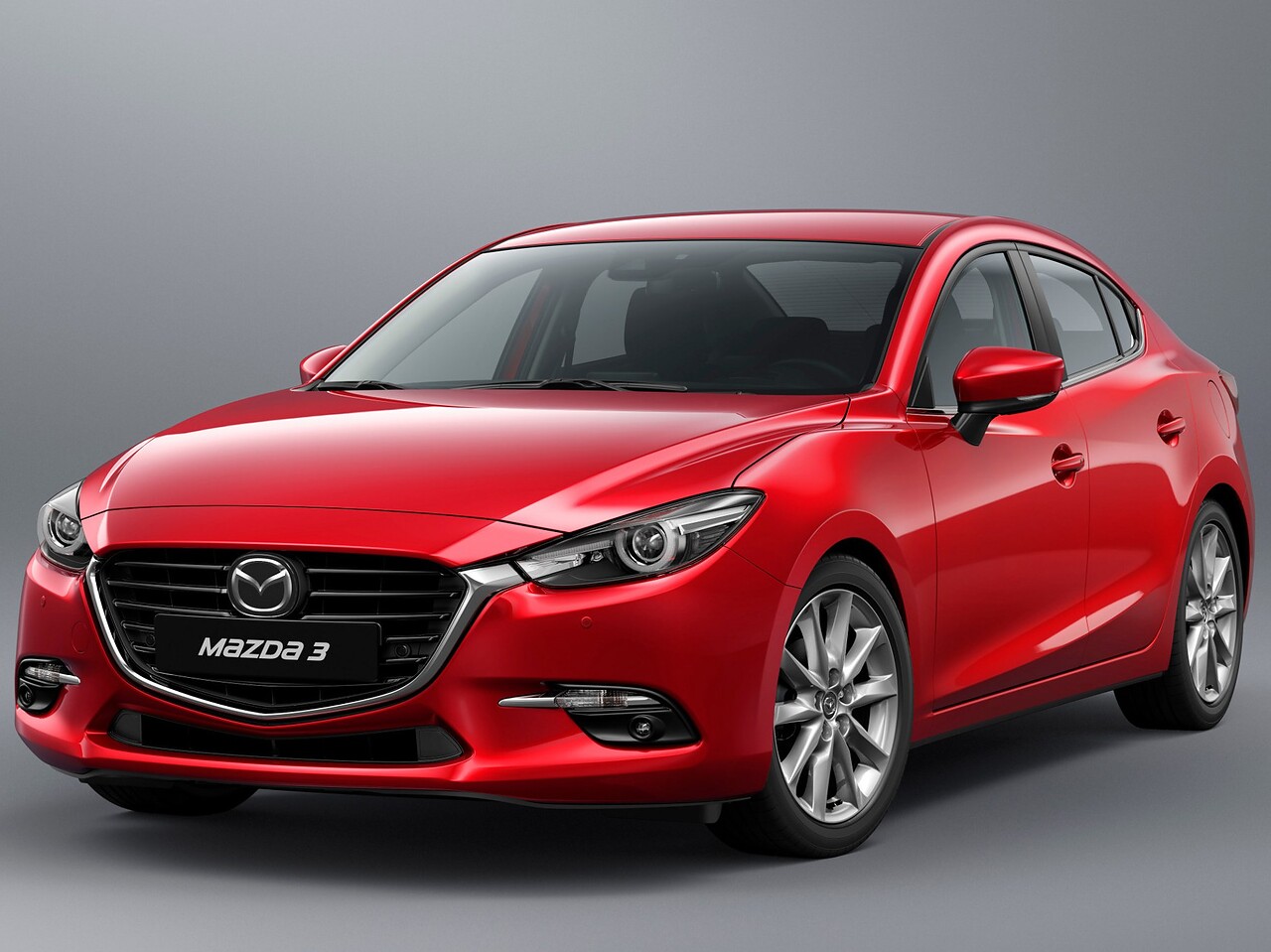 Mazda 3 седан (III поколение рестайлинг, 2016 - 2019 г.в.): вид спереди сбоку