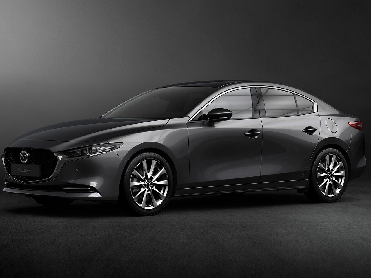 Mazda 3 седан (IV поколение, 2019 - 2020 г.в.): вид спереди сбоку