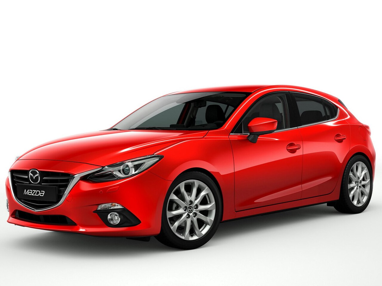 Mazda 3 хэтчбек 5-дв. (III поколение, 2013 - 2016 г.в.): вид спереди сбоку