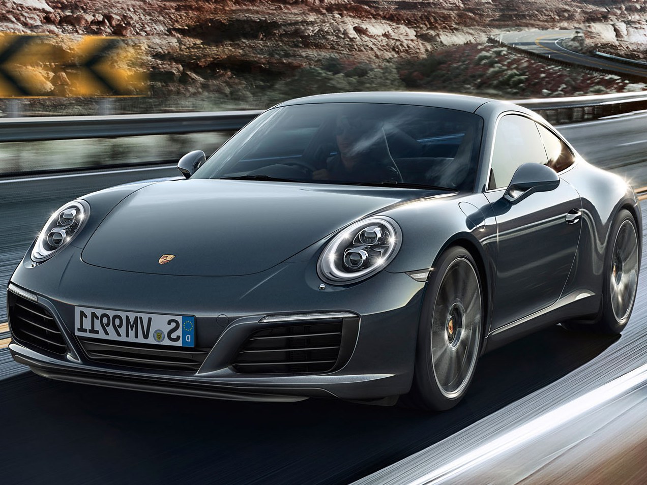 Porsche 911 Carrera купе (991 рестайлинг, 2015 - 2020 г.в.): Три четверти спереди в движении