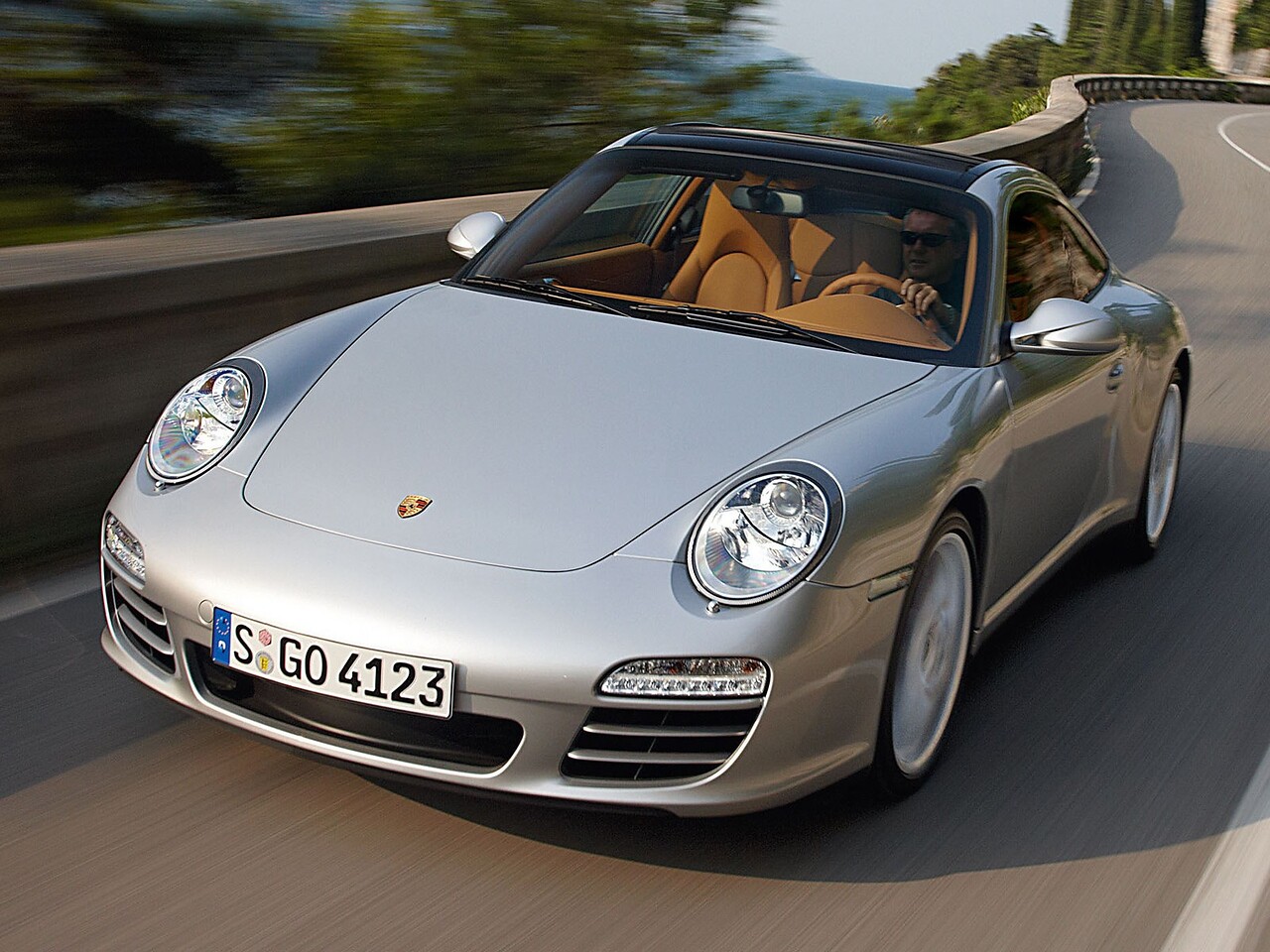 Porsche 911 Targa 4 купе (997, 2004 - 2014 г.в.): Три четверти спереди в движении