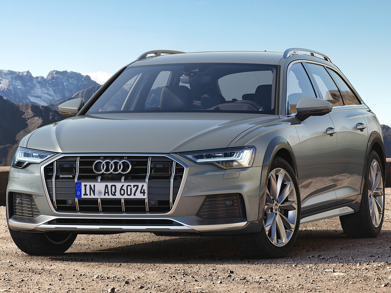 Audi A6 Allroad (C8, 2019 - 2022 г.в.): вид спереди сбоку на каменистой площадке в горах