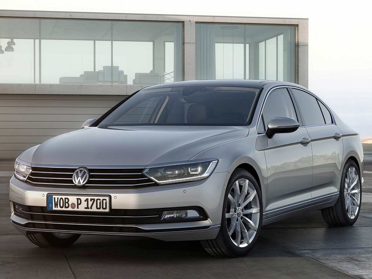 Volkswagen Passat седан 1.8 AT Highline: Три четверти спереди у здания