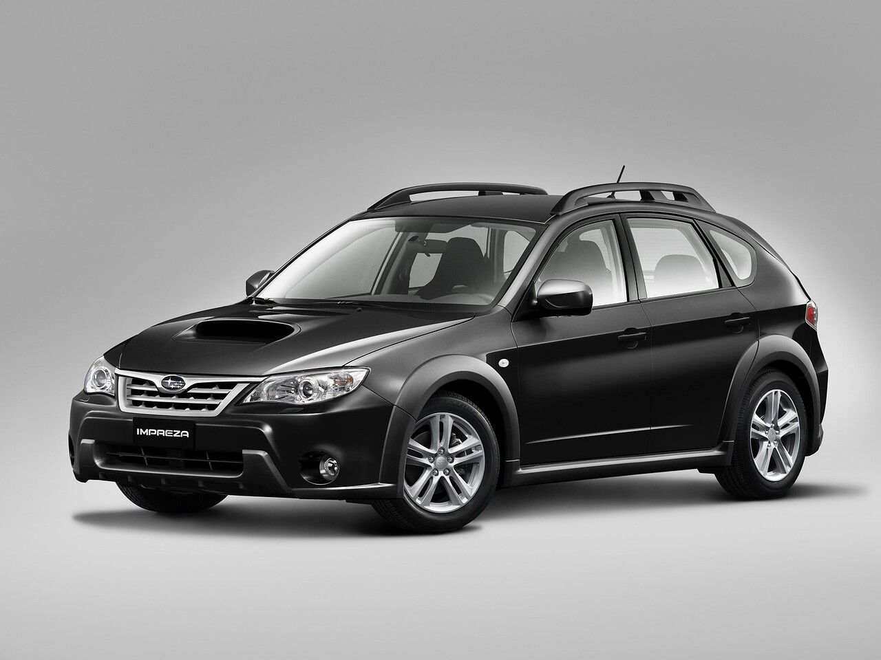 Subaru Impreza XV 2.0 AT 1J: Три четверти спереди, чёрный кузов