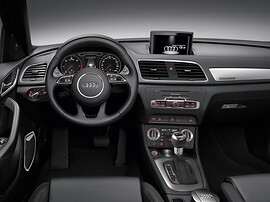 Audi Q3 (I поколение, 2011 - 2014 г.в.): Салон: руль, приборы и центральная консоль