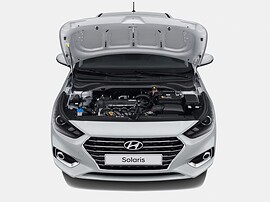 Hyundai Solaris седан (II поколение, 2017 - 2020 г.в.): Открытый капот и моторный отсек
