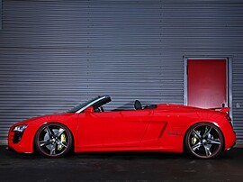 Audi R8 Spyder 4.2 FSI quattro AT: Профиль у стены, красный кузов