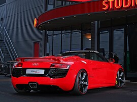 Audi R8 Spyder 4.2 FSI quattro AT: Сзади сверху у здания, красный кузов