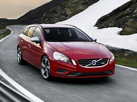 Volvo V60 (I поколение, 2010 - 2014 г.в.): Три четверти спереди на закате, красный кузов