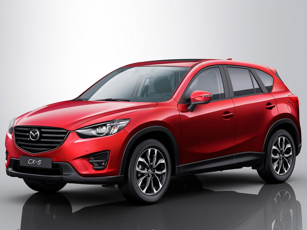 Mazda CX-5 (I поколение рестайлинг, 2015 - 2016 г.в.): вид спереди сбоку