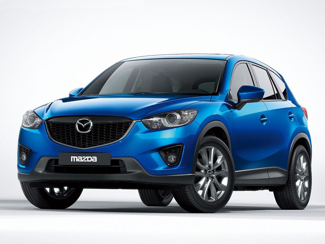 Mazda CX-5 (I поколение, 2011 - 2015 г.в.): вид спереди сбоку
