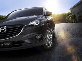Mazda CX-9 (I поколение рестайлинг, 2012 - 2015 г.в.): вид спереди сбоку