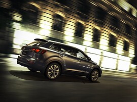 Mazda CX-9 (I поколение рестайлинг, 2012 - 2015 г.в.): вид сзади сбоку у здания