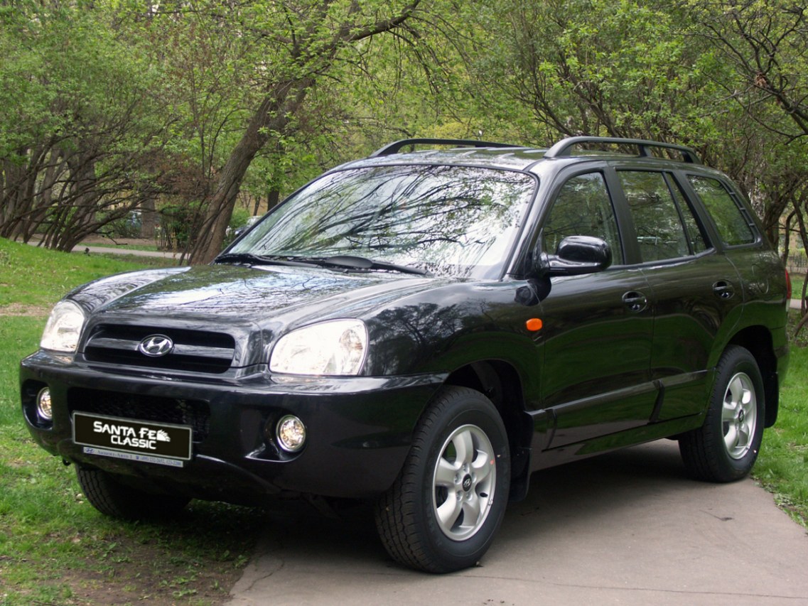 ТагАЗ Hyundai Santa Fe Classic (I поколение, 2007 - 2012 г.в.): вид спереди сбоку