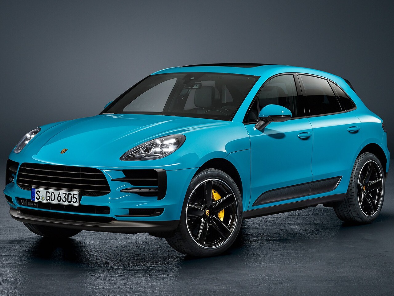 Porsche Macan (I поколение рестайлинг, 2018 - 2021 г.в.): вид спереди сбоку