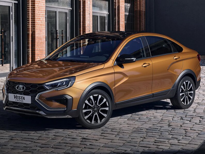 ВАЗ (Lada) Vesta Cross седан 1.6 (106 л.с.) MT Drive25: вид спереди сбоку у здания