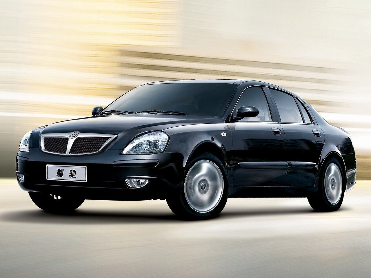 Brilliance M1 (Zhonghua, 2005 - 2010 г.в.): вид спереди сбоку, чёрный седан на светлой поверхности