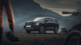 Haval H5: вид спереди сбоку в горах