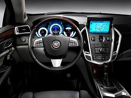 Cadillac SRX (II поколение, 2010 - 2014 г.в.): Приборная панель и экран навигации
