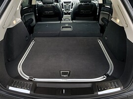 Cadillac SRX (II поколение, 2010 - 2014 г.в.): Открытый багажник со сложенными задними сиденьями