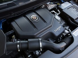 Cadillac SRX (II поколение, 2010 - 2014 г.в.): Моторный отсек с декоративной крышкой