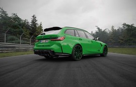 BMW M показала серию «100 Jahre Nürburgring» к столетию трассы: зелёный универсал вид сзади сбоку на трассе